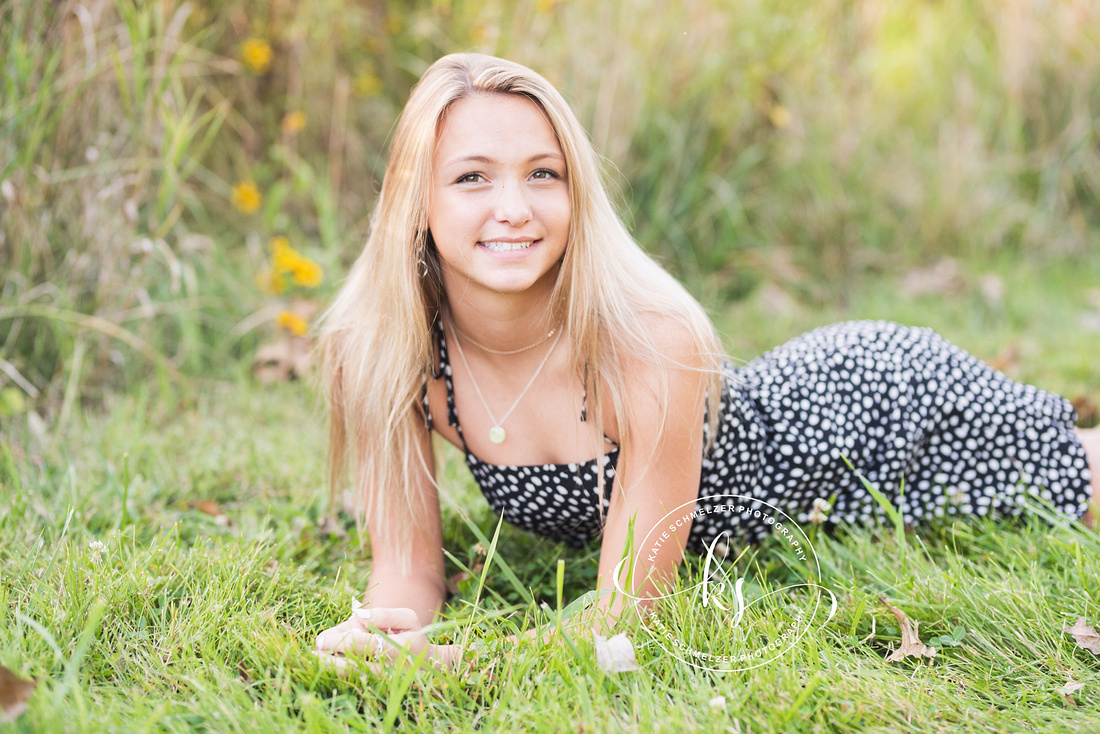 Senior portraits with soccer star in Tiffin IA photographed by KS Photography