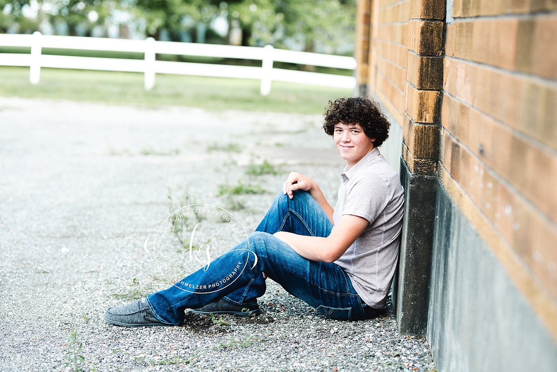 Senior portraits on family farm in Iowa with KS Photography