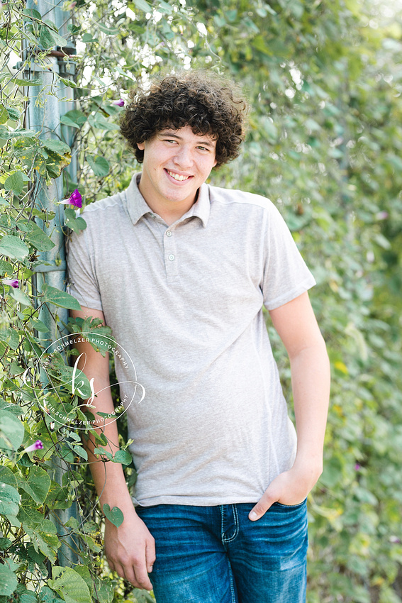 Senior portraits on family farm in Iowa with KS Photography