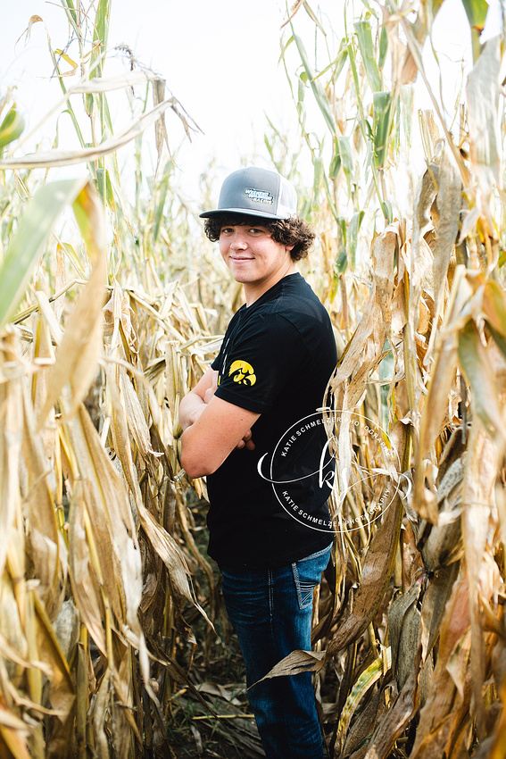 Senior portraits on family farm in Iowa with KS Photography