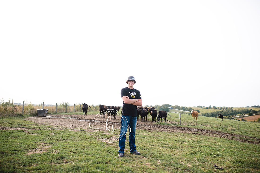 Senior portraits on family farm in Iowa with KS Photography