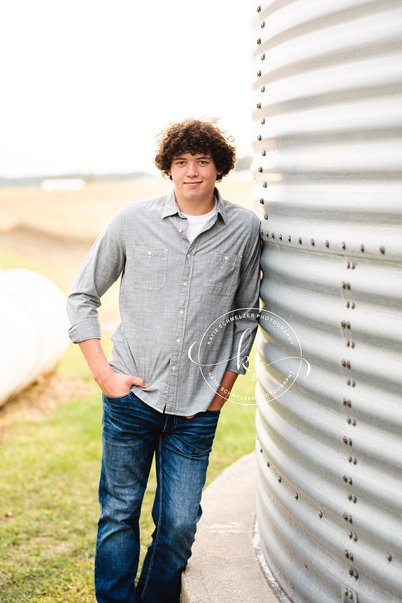 Senior portraits on family farm in Iowa with KS Photography