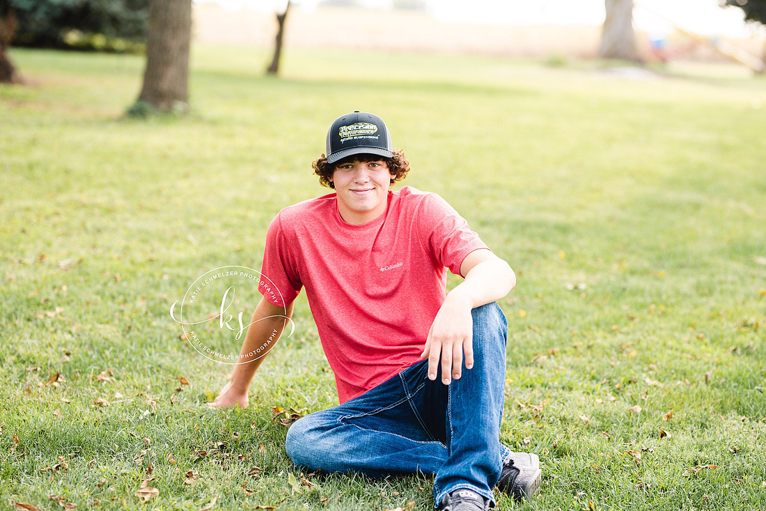 Senior portraits on family farm in Iowa with KS Photography