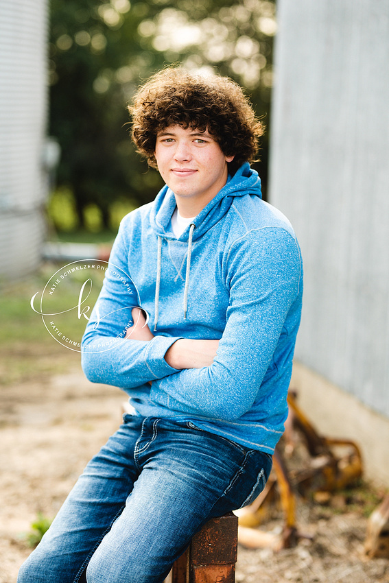 Senior portraits on family farm in Iowa with KS Photography