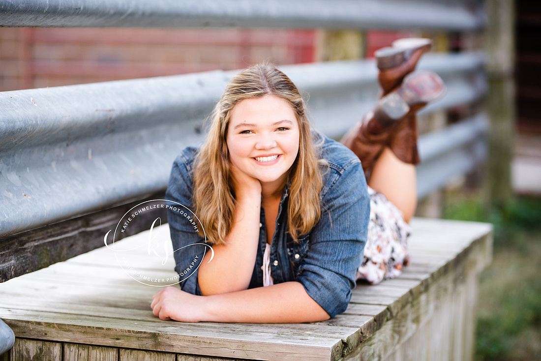 Oxford IA senior portraits with young lady on farm photographed by KS Photography