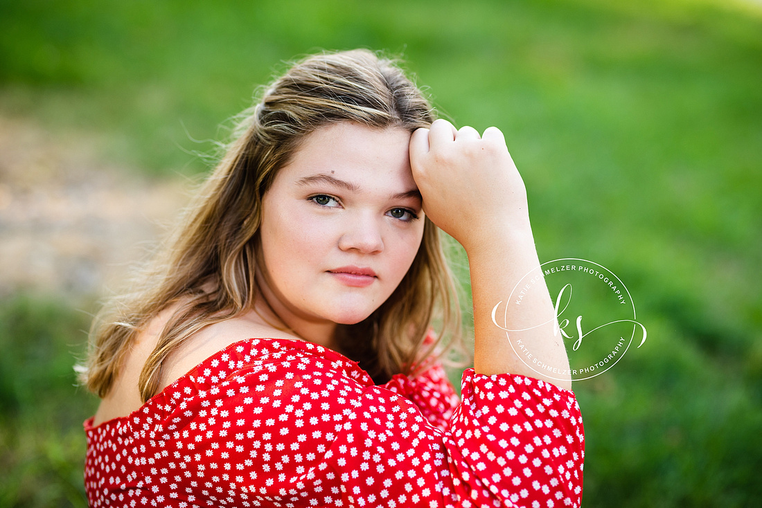 Oxford IA senior portraits with young lady on farm photographed by KS Photography