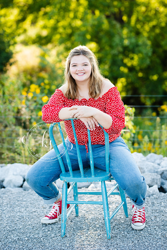 Oxford IA senior portraits with young lady on farm photographed by KS Photography