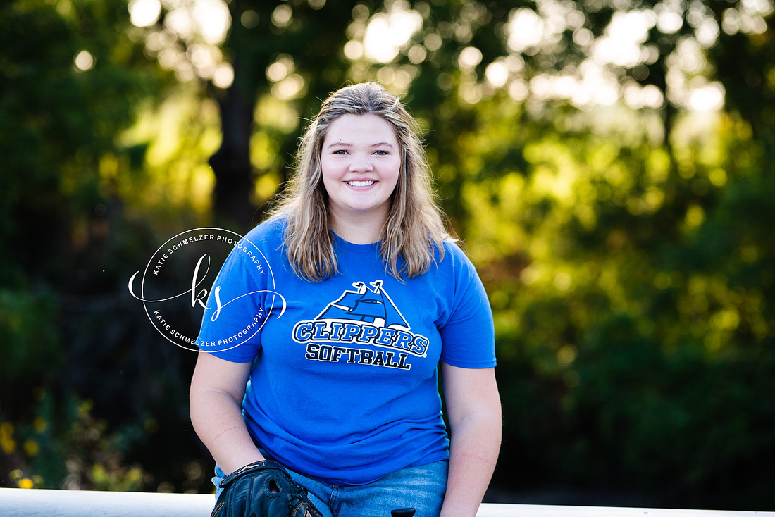 Oxford IA senior portraits with young lady on farm photographed by KS Photography