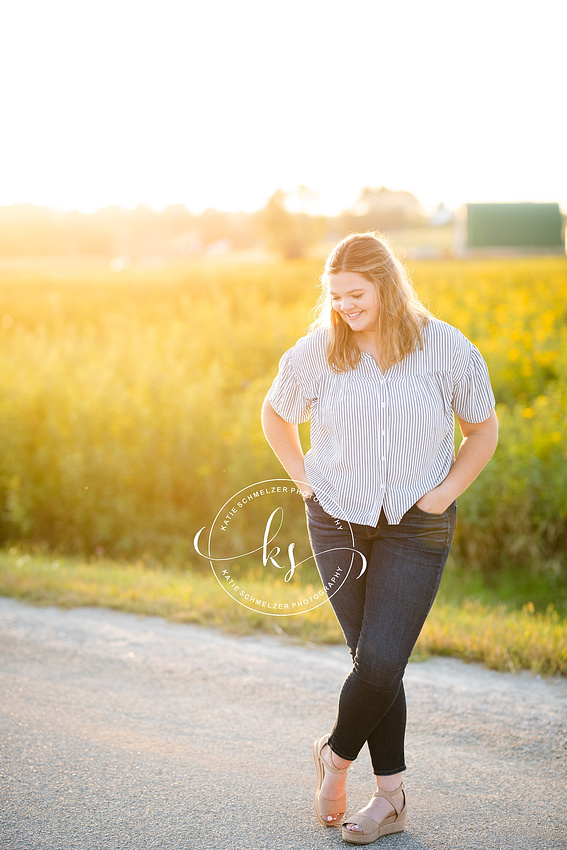 Oxford IA senior portraits with young lady on farm photographed by KS Photography