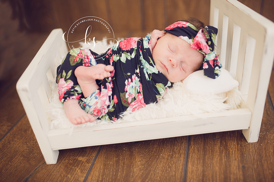 Studio newborn portraits for baby girl in Tiffin IA studio with KS Photography