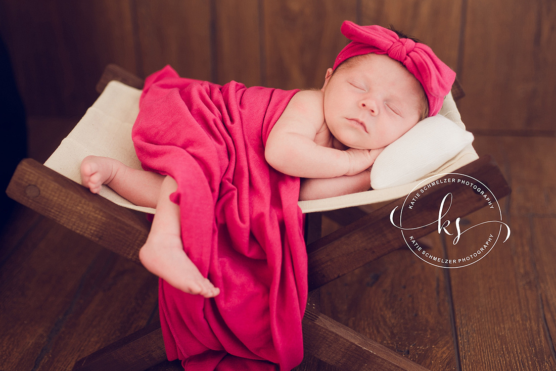 Studio newborn portraits for baby girl in Tiffin IA studio with KS Photography